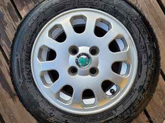 Prodám nové pneu s disky pro Škoda Felicia a Škoda Forman - 6