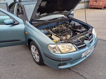 Nissan almera 1.5i benzin 66kw r.2003 stk 2026/5 - 6