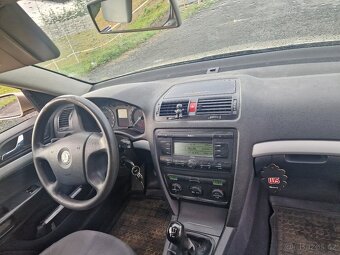 Škoda Octavia 1.9 tdi 77 kw - tempomat - digi klima - - 6