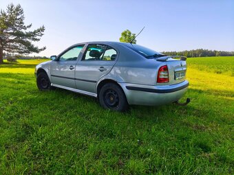 Škoda octavia 1.6 75 kw - 6