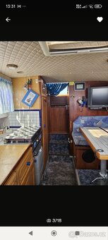 Kajutový motorový člun 7m x 2,5 - 6