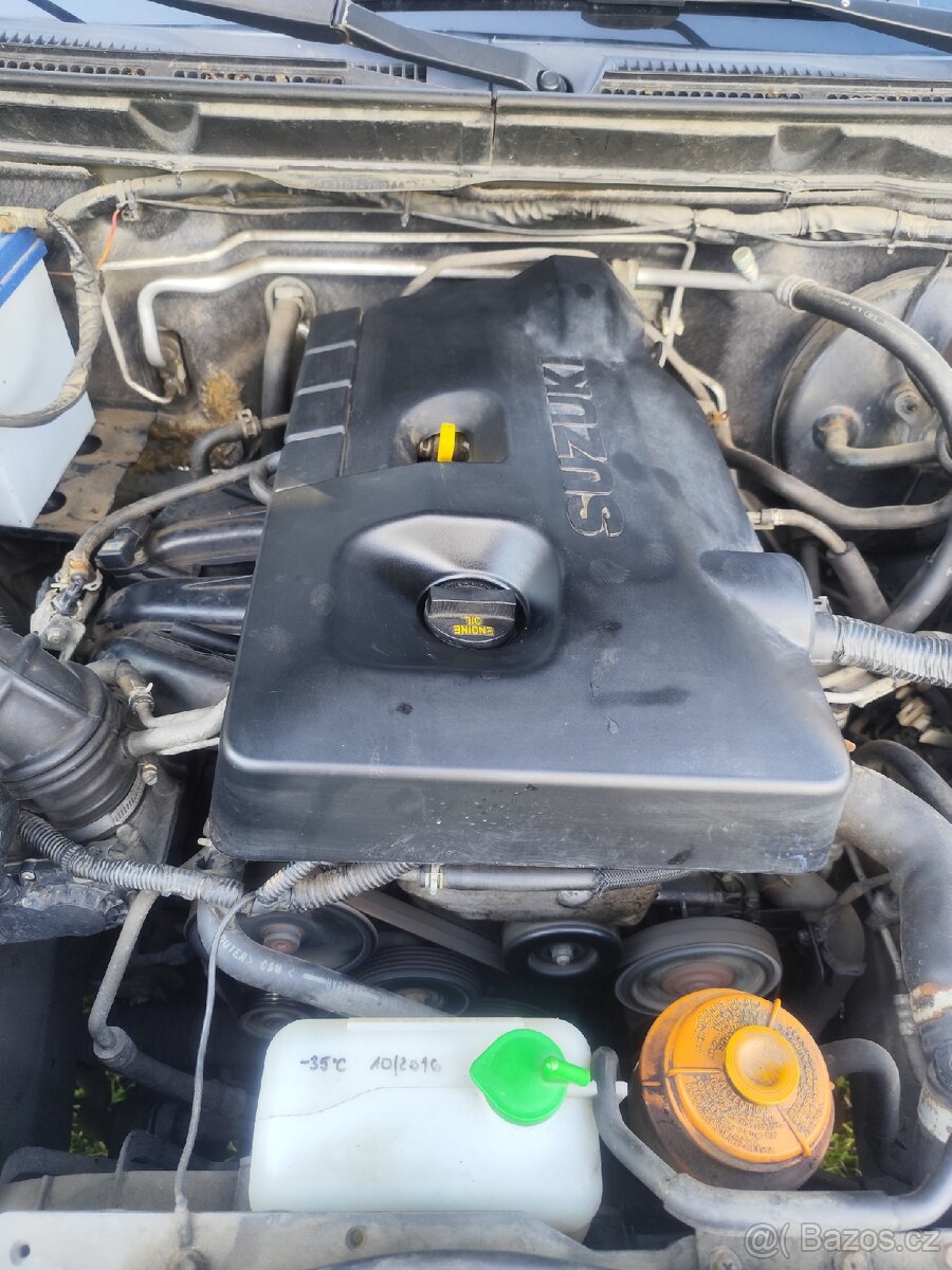 Suzuki grand Vitara 2l. Benzín 103kw 2006 - 7