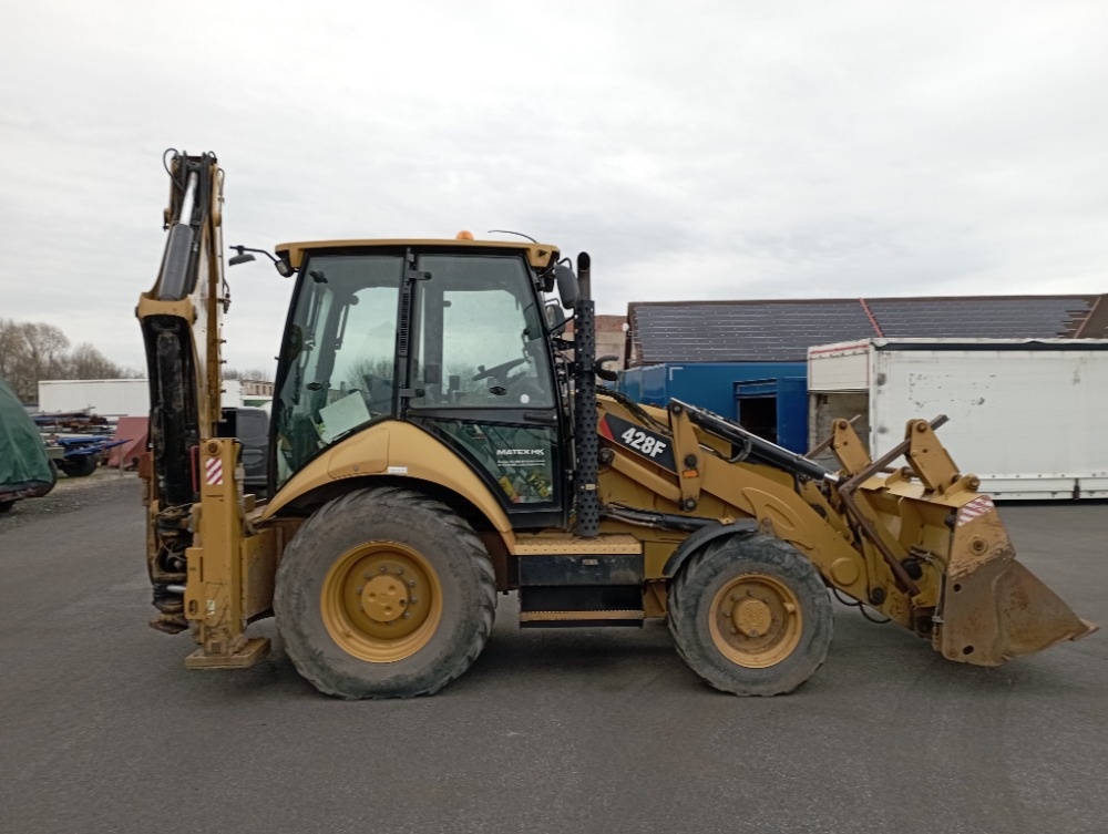 Prodám Caterpillar 428F, rok 2015 - 7