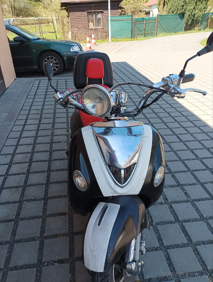 Skútr 125 - 7