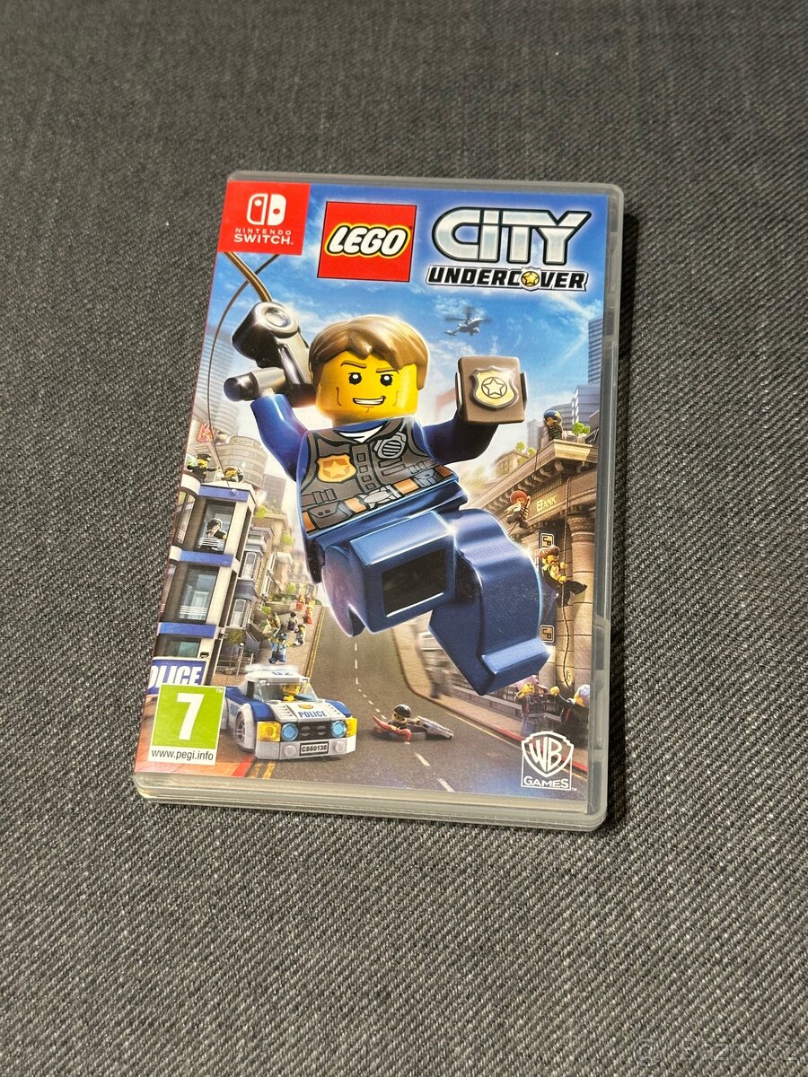 Nintendo Switch + 7 her + 2 ovladače JoyCon - 7