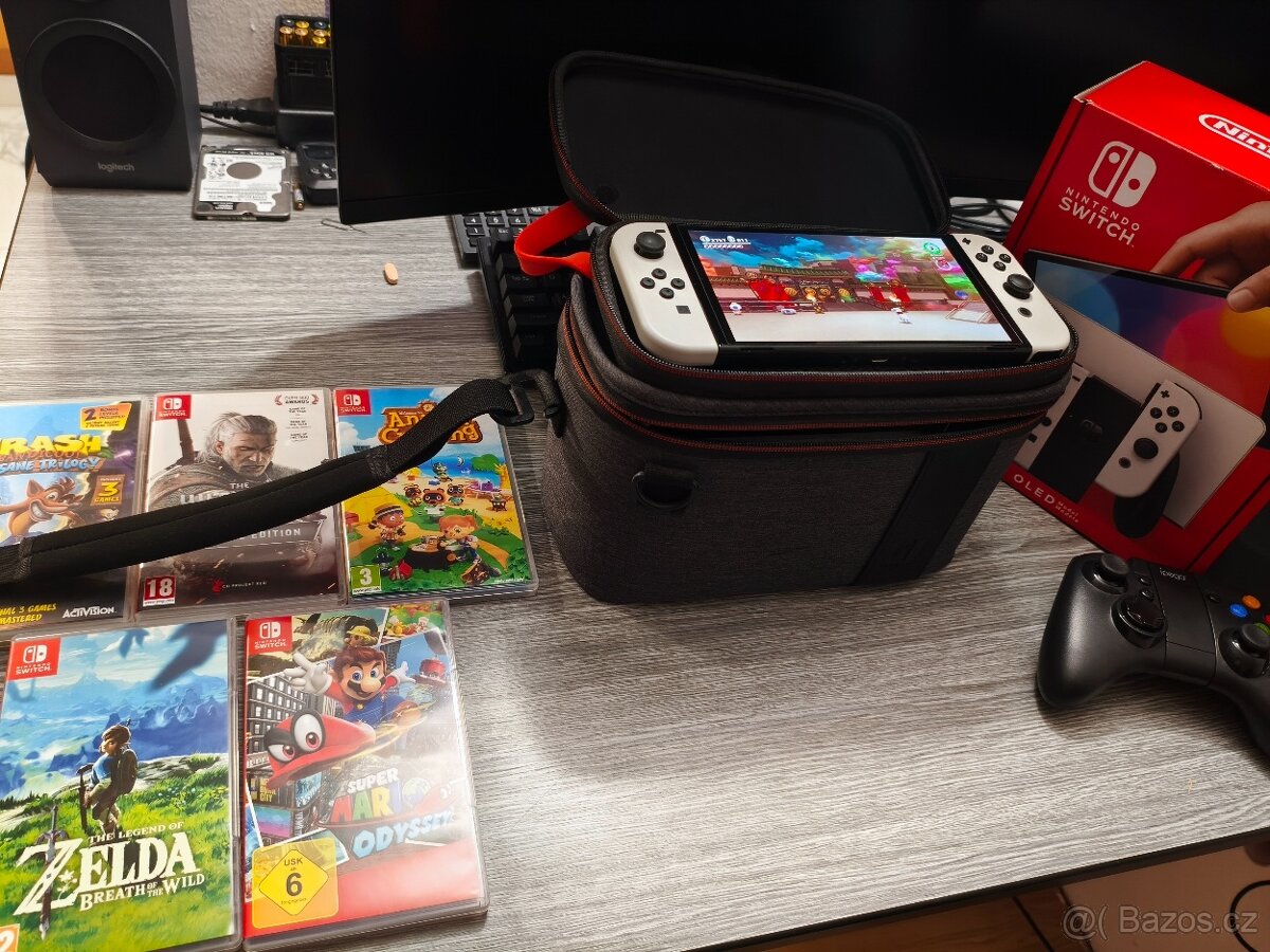 Nintendo Switch OLED (Full set) + 5 TOP her + Velký kufr + 2 - 7