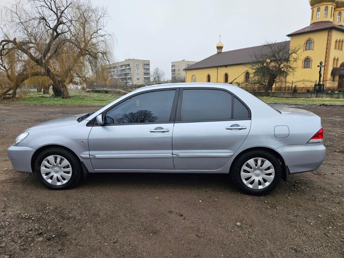 Mitsubishi Lancer, 1.6 - 7