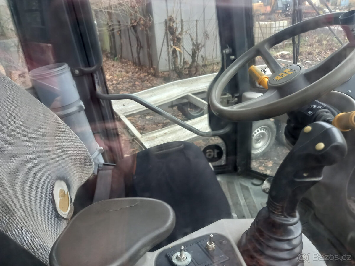 Kolový nakladač JCB 407 - - 7