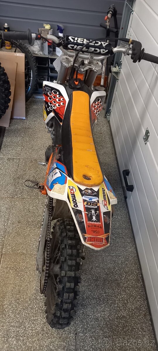 KTM 65 + náhradní díly + oblečení - 7