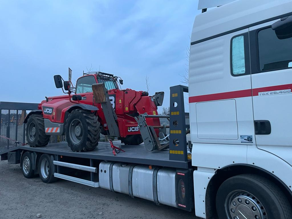 Teleskopický manipulátor, přeprava strojů - 7