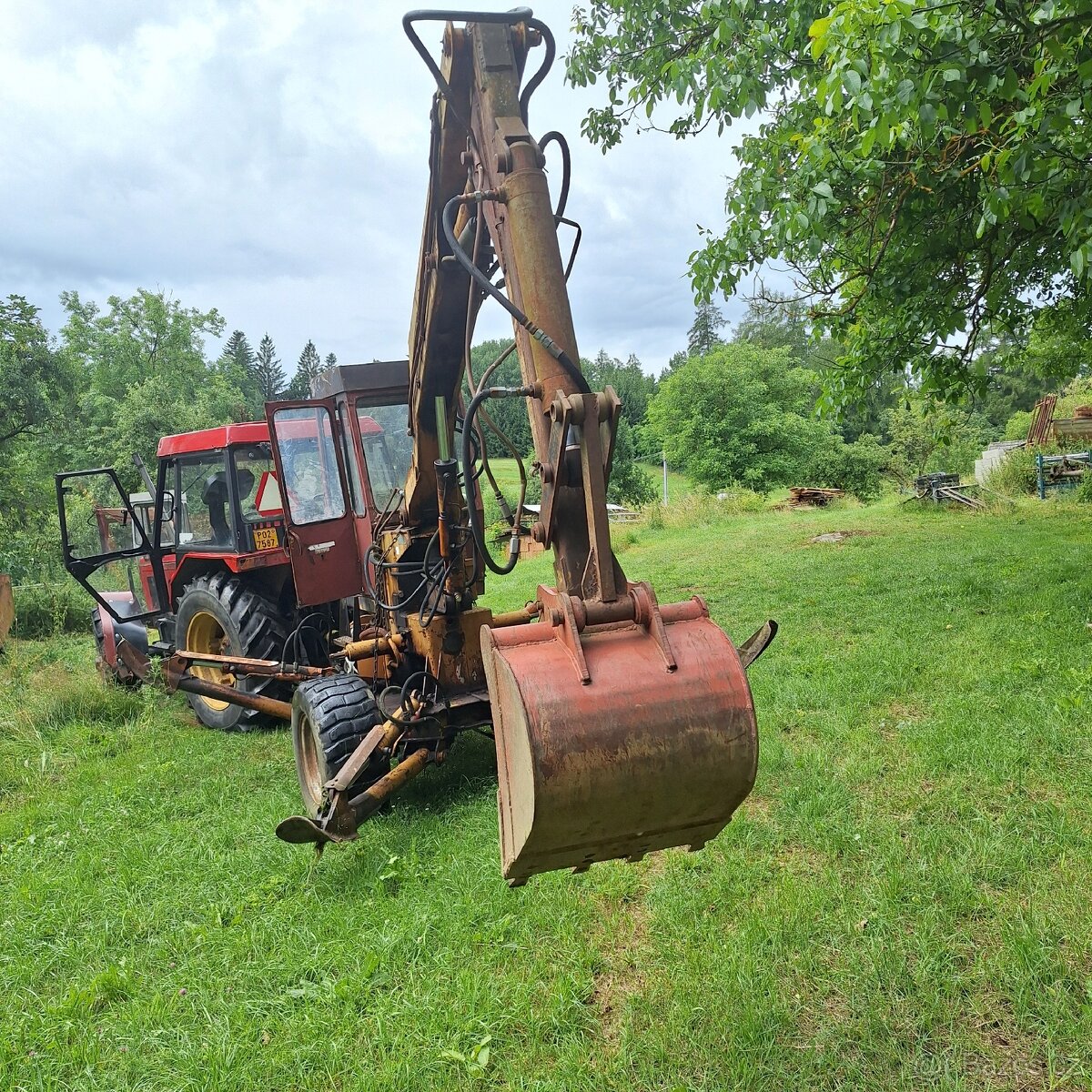 Nakladac unhz 750 bagr - 7