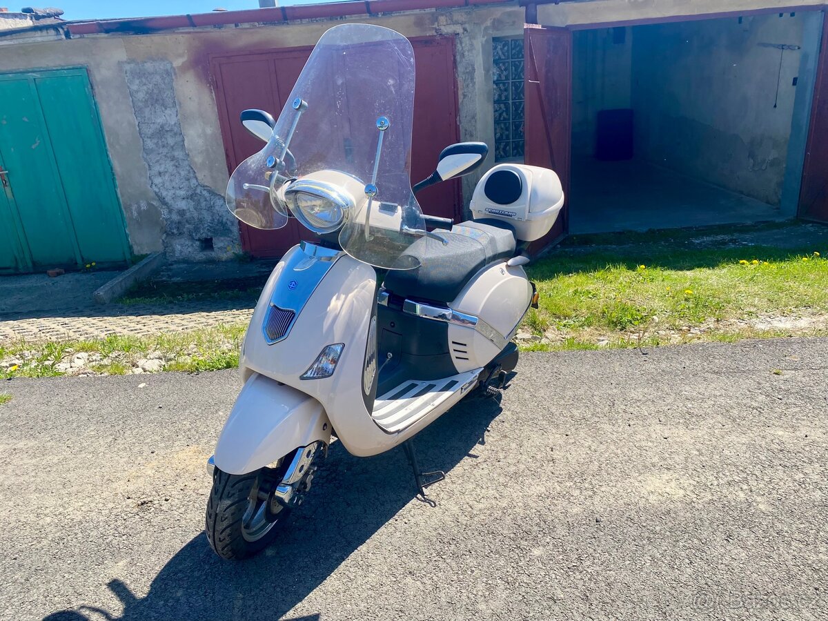 Skůtr 125 - 7