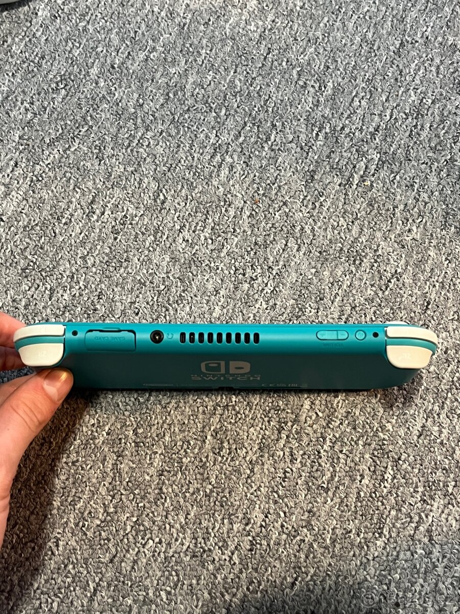 Prodám Nintendo Switch Lite (modra) + pouzdro + hry - 7