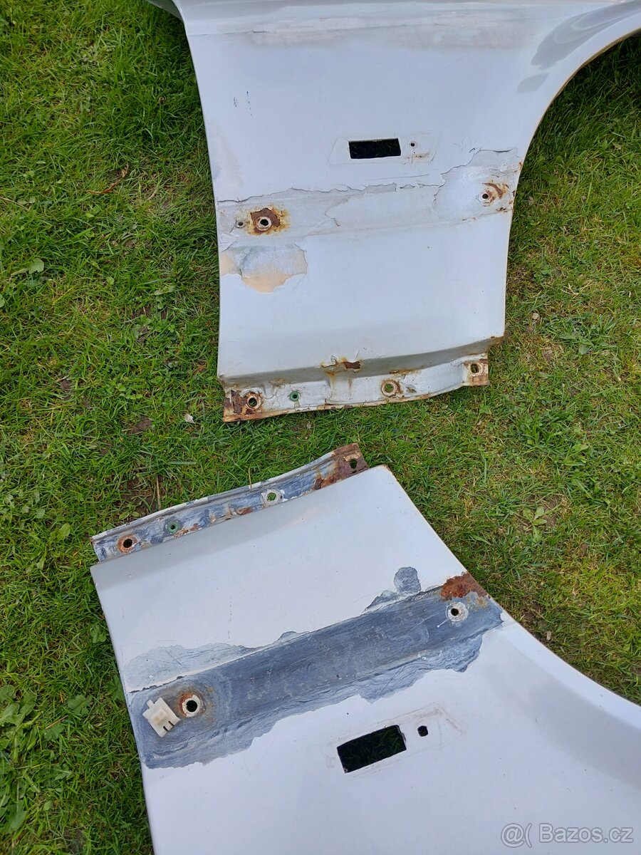 BMW e32 plechařina - 7