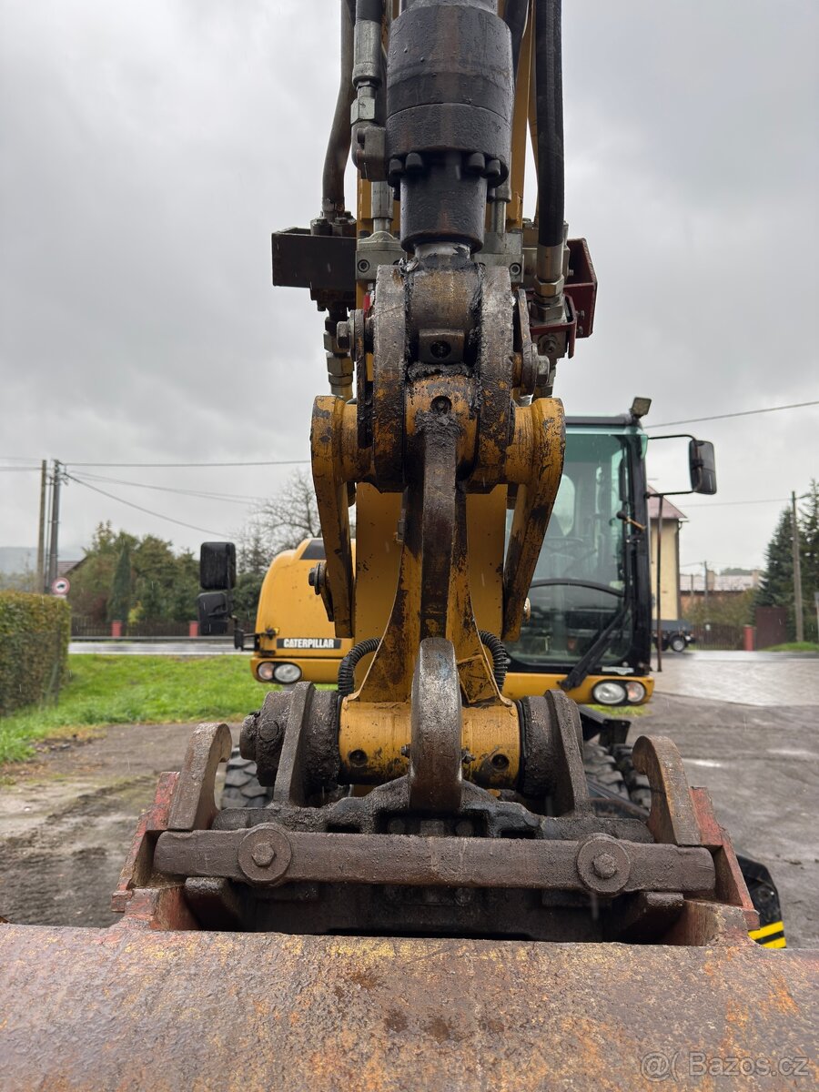 Kolový rypadlo Caterpillar M316D - 7