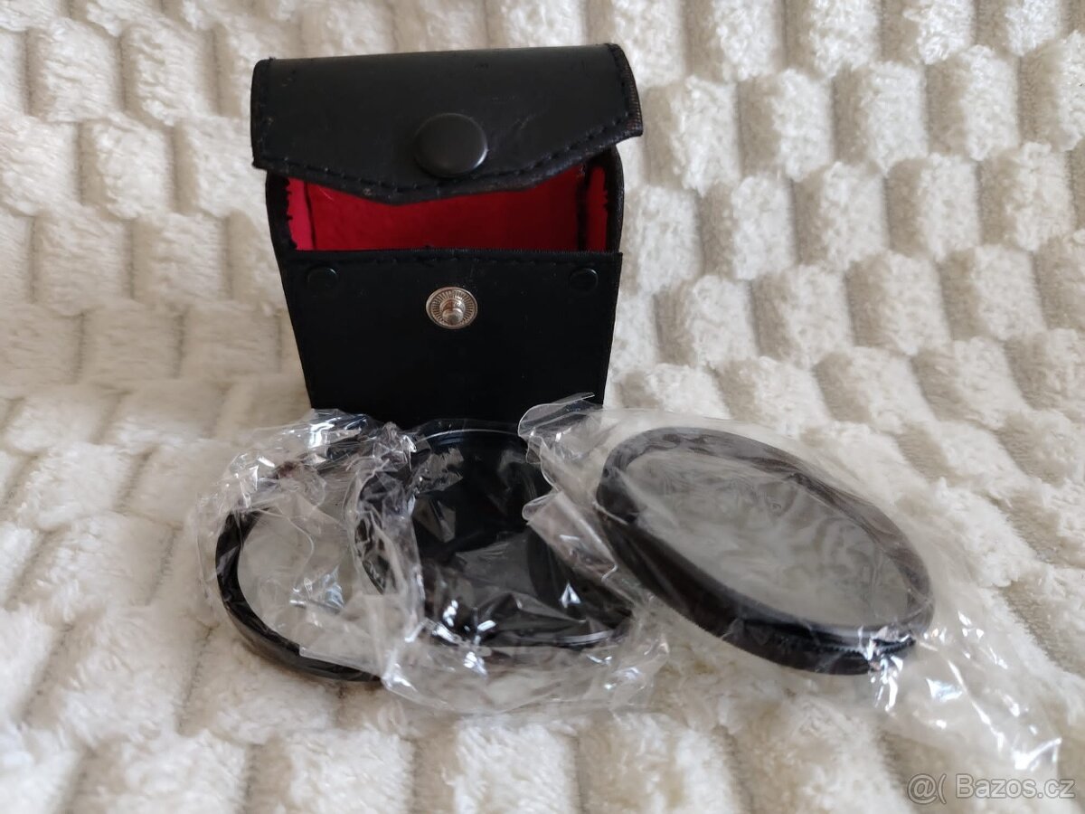 canon s objektivy a taškobatůžkem - 7