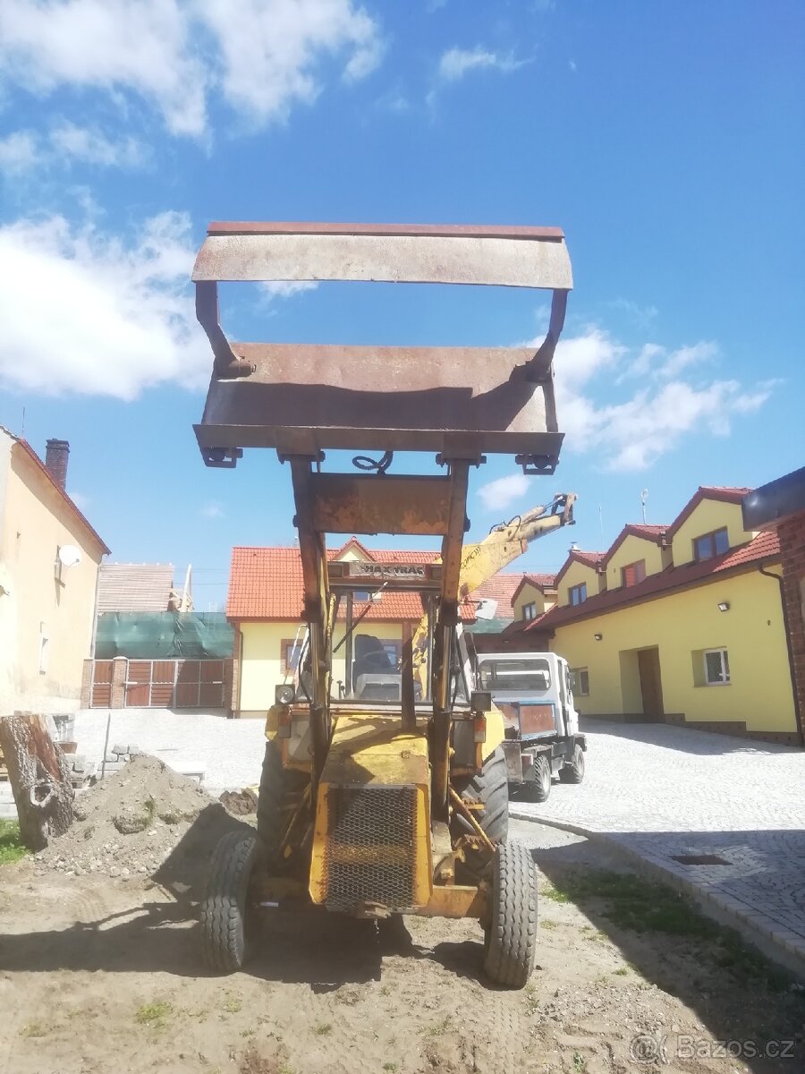 Kolový bagr JCB 3CX - 7