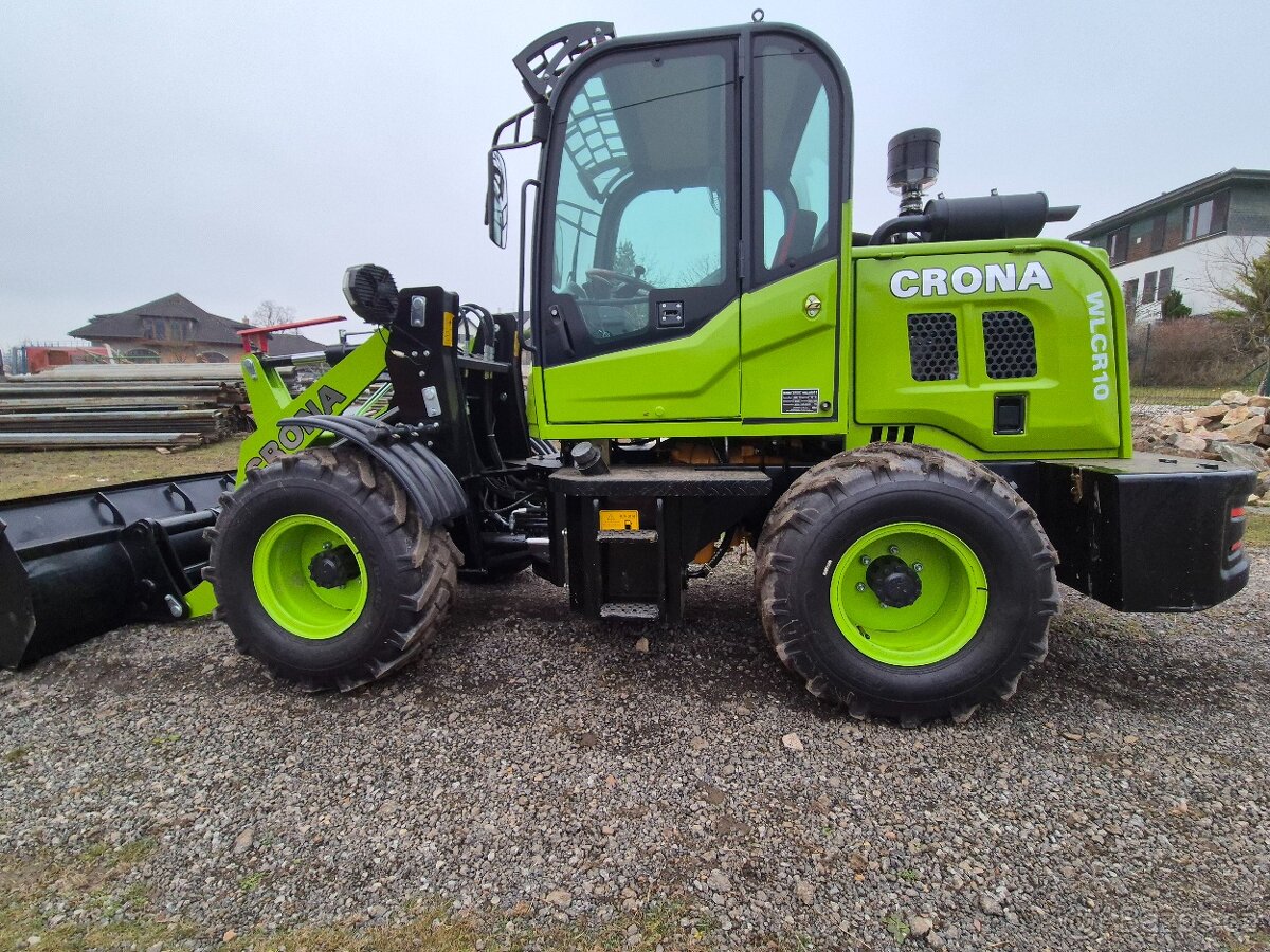 Nádherný nakladač 4x4 .vytápění. - 7