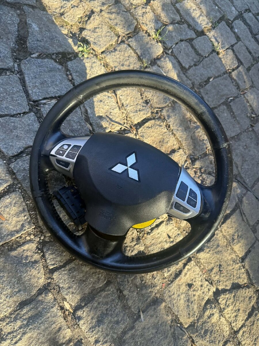 Volant Mitsubishi lancer - 7