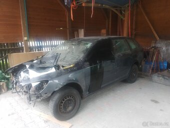 Octavia 2 kombi 77kw 1.2 TSI FL facelift nebouraná na ND - 7