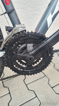 Trekové kolo KRON TX-100, Kotouč. brzdy, Řazení Shimano - 7