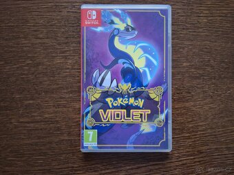 NINTENDO SWITCH OLED (bílá verze) + 4 HRY A CESTOVNÍ OBAL - 7