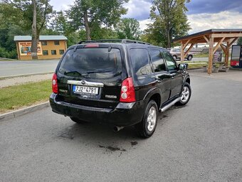 Mazda tribute 2.3 i    4×4 - 7