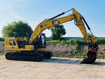 Pásový bagr Caterpillar 323 - 7