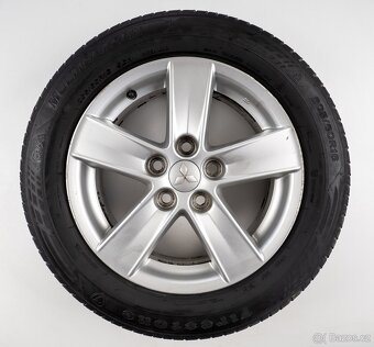 Mitsubishi Lancer - Originání 16" alu kola - Celoroční pneu - 7