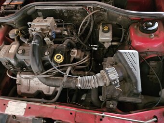 FORD ESCORT 1,4 OHC. 55kW, r.v 1995 - 7