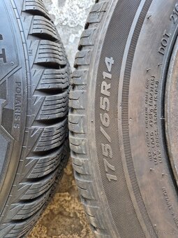 FORD 4x108 zimní sada 175/65 R14 DOT 20+22 5.5Jx14 ET37,5 - 7