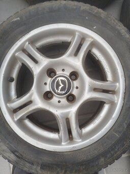 Litá alu kola Zender, mazda 323f bj - 7