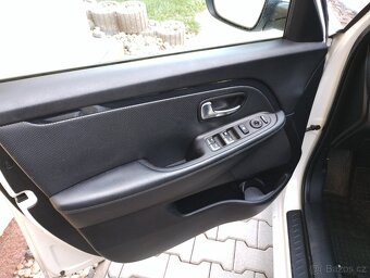 Kia Carens - 7