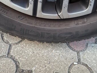 Plechové disky pneu Nokian 185/65 R14 4x100 - 7