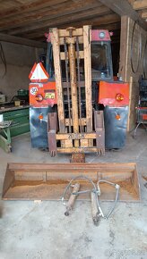 Zvedačka za traktor s vyklápěcí lopatou - 7