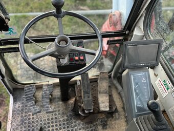 kolesovy bager Takeuchi TB70W - 7
