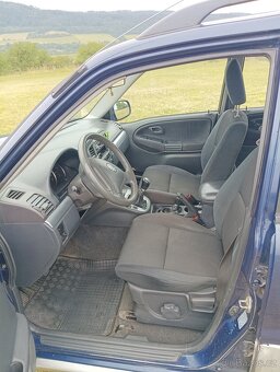 Suzuki Grand Vitara 2.0 - 7
