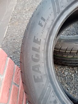 235/55R18 - 7