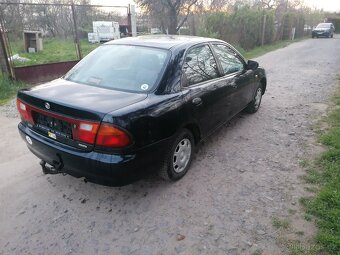 Mazda 323 - 7
