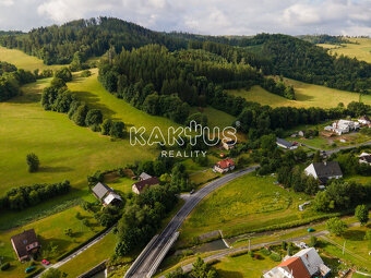 Prodej stavebního pozemku 2.693 m2, Holčovice- Hejnov, okres - 7
