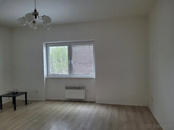 PRODÁM 2x bytová jednotka, 1x garáž + stavební pozemek - 7