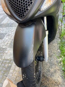 Suzuki Sixsteen 125 - 7