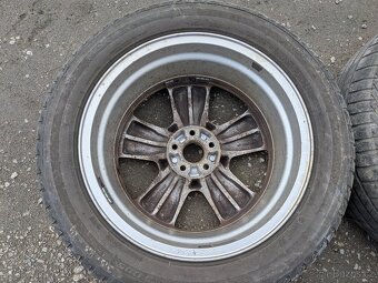 17" ALU kola Subaru 7Jx17 ET 48 + pneu Bridgestone 215/55R1 - 7
