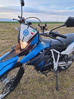 Yuki 125i SG - 7