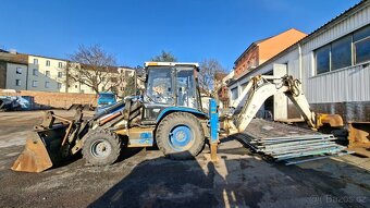 CATERPILLAR 428 C 4X4 - 7