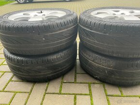 4x zachovalé alu disky 5x100 R16, letní pneu 50% - 7