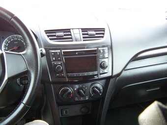 Suzuki Swift 1.2 i 4x4 69 kW r.v.2012 - 7