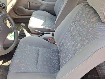 Toyota Corolla E11 1,3 63 kW - 7