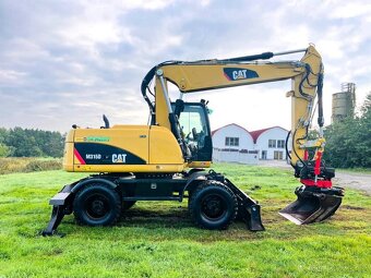 Kolové rypadlo Caterpillar M315D - 7