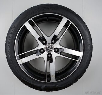 Opel Astra - 17" alu kola - Letní pneu - 7